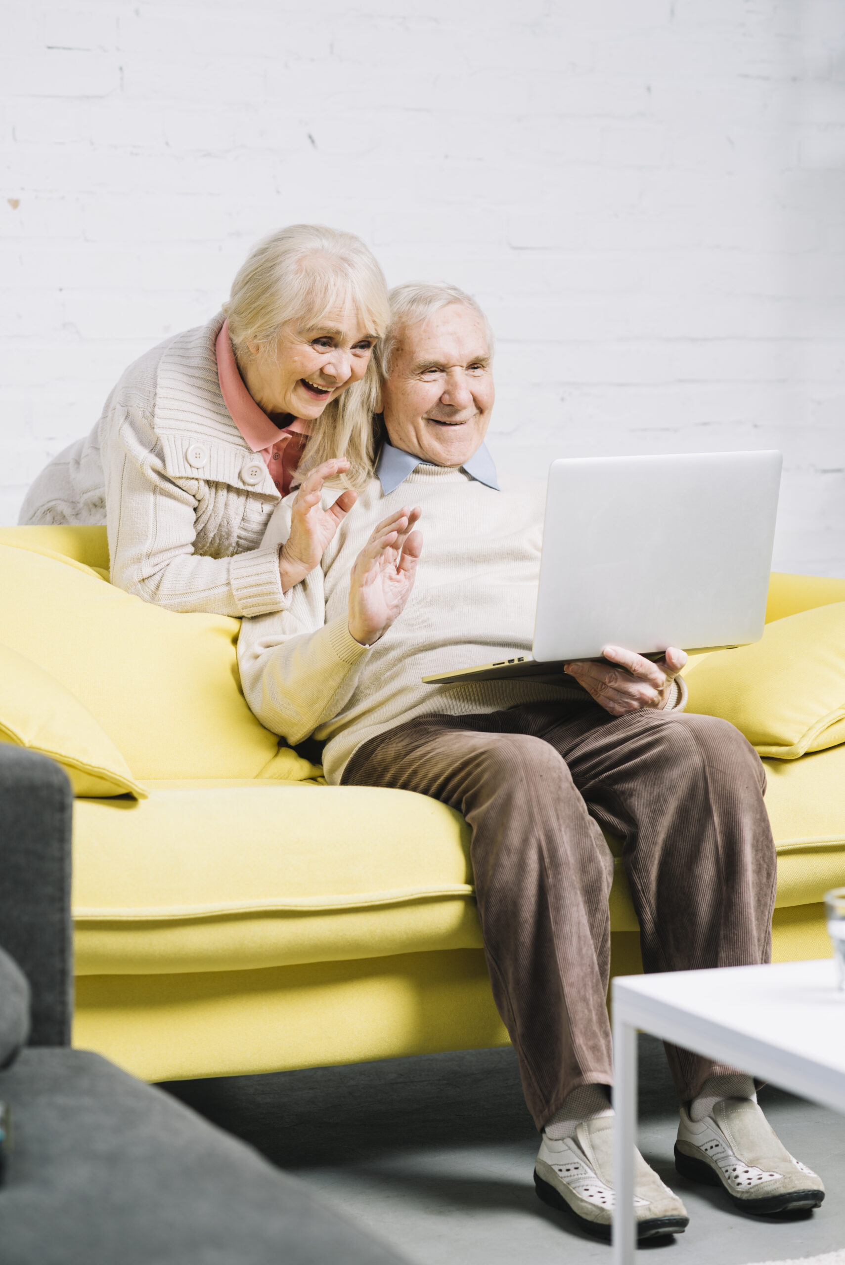 senior-couple-using-laptop